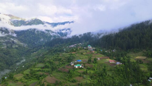 Drone Shot of a cloudy Sainj Valley in Himachal Pradesh near Manali, Kasol