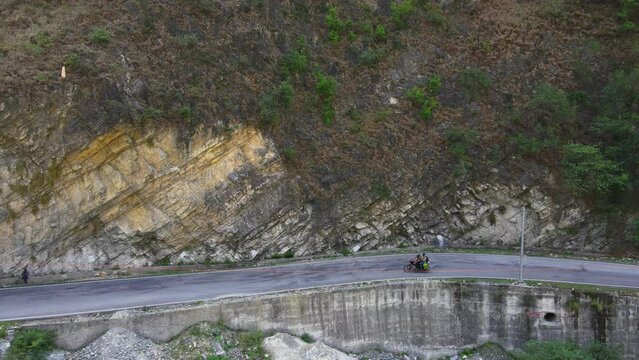 Drone Shot of a bike and road in Himachal Pradesh near Manali, Kasol