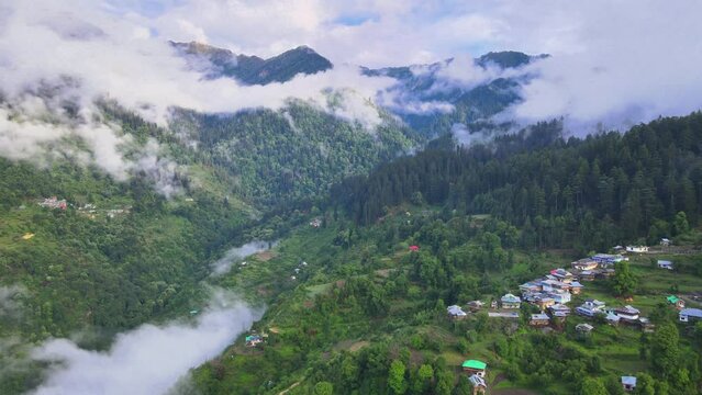 Drone Shot of a cloudy Sainj Valley in Himachal Pradesh near Manali, Kasol