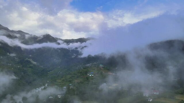 Drone Shot of a cloudy Sainj Valley in Himachal Pradesh near Manali, Kasol