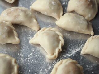 raw mini curry puff on tray