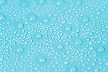 water drops on a blue background close-up