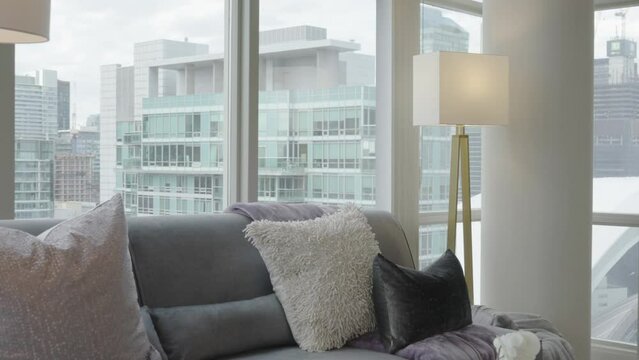 Reveal the view from living area of a high-rise condominium unit