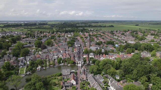 Aerial view of the drawbridge over the river Vecht and the church tower in the village of Loenen Aan De Vecht
