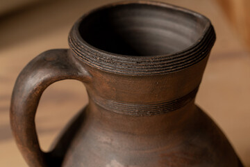 Pottery Craft. a ceramic product with your own hands, made on a Potter's wheel isolated on a white background.