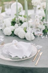 Beautiful wedding table decoration and table setting. Floral design table set.