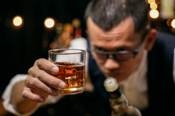 Barman pouring whiskey whiskey glass beautiful night