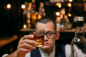 Barman pouring whiskey whiskey glass beautiful night