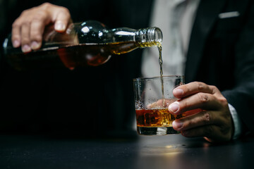 Barman pouring whiskey whiskey glass beautiful night