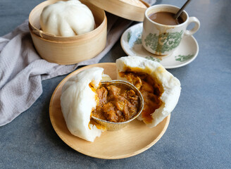 Popular Malaysian street food. Steamed Curry Chicken Bao or Buns. Rich curry taste with soft and fluffy pastry goes well with strong milked coffee.