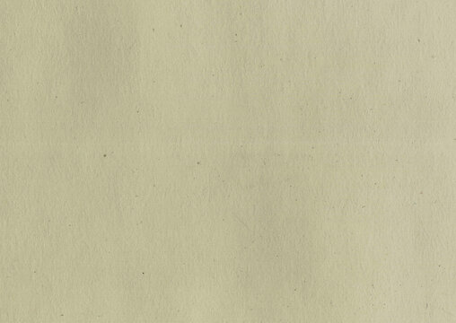High quality scan top view of an old, uncoated, weathered, yellowed, green, beige paper texture background with small dust particles and fine grain fiber high resolution wallpaper