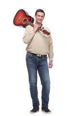 Casual music lover carrying guitar on his shoulders,