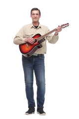 Naklejka premium Handsome young man playing guitar on white background