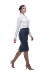 businesswoman in a white blouse and black skirt striding forward.