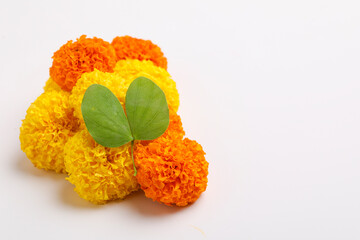 Happy Dussehra greeting card , green leaf and marigold flower.