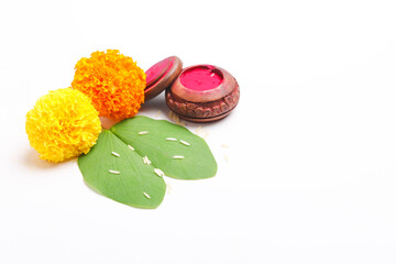 Happy Dussehra greeting card, green leaf,Rice and kumkum.