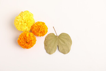 Happy Dussehra greeting card , green leaf and marigold flower.