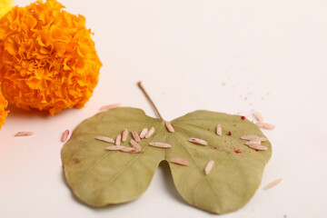 Happy Dussehra greeting card , green leaf and marigold flower.