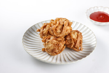Udang Rambutan or chinese fried dumpling from shrimp ball coated with shraded dumpling skin then deep fried.