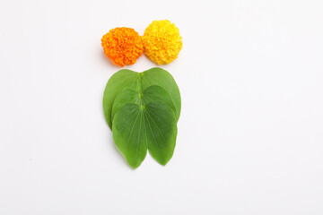 Happy Dussehra greeting card , green leaf and marigold flower.