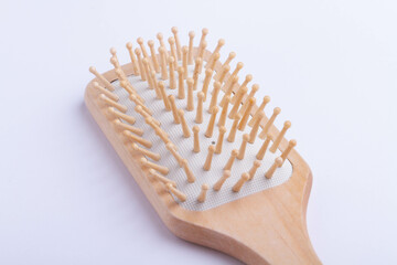 Massage comb to stimulate hair growth. Comb on isolated background.