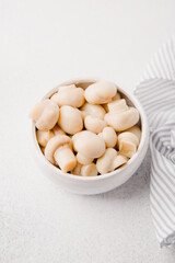 Marinated champignons in a bowl. Ready to eating.