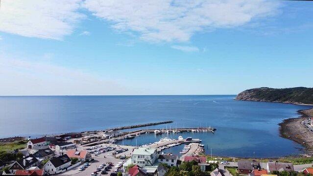 Circling around Molle, Sweden. Aerial view showing a marina.