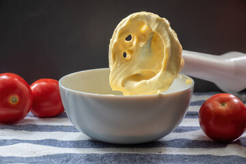 mayo home made close up view. Homemade mayonnaise made by organic eggs with yellow yolk. Making mayo