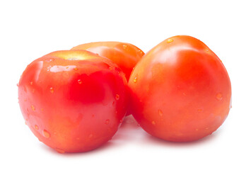 Close up photo, three fresh red tomatoes isolated on white background with clipping path