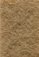 Fototapeta na wymiar Beige coconut fiber texture. Rough surface texture. Fibrous texture. Pressed fibres.