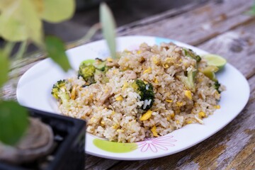 Fried rice is an easy and delicious dish.  consisting of eggs  Pork and broccoli and still affordable during bad economic times.