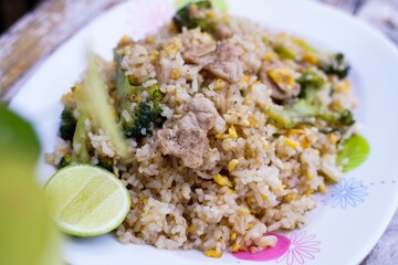 Fried rice is an easy and delicious dish.  consisting of eggs  Pork and broccoli and still affordable during bad economic times.