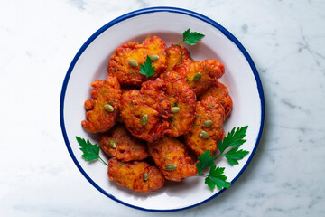 Pumpkin fritters typical of Spain. Traditional recipe made with egg and pumpkin.