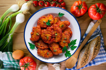 Pumpkin fritters typical of Spain. Traditional recipe made with egg and pumpkin.