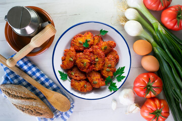 Pumpkin fritters typical of Spain. Traditional recipe made with egg and pumpkin.