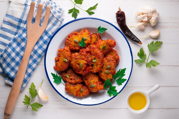 Pumpkin fritters typical of Spain. Traditional recipe made with egg and pumpkin.