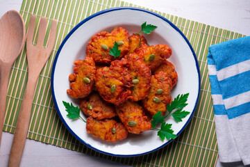 Pumpkin fritters typical of Spain. Traditional recipe made with egg and pumpkin.