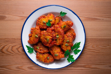 Pumpkin fritters typical of Spain. Traditional recipe made with egg and pumpkin.