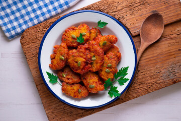Pumpkin fritters typical of Spain. Traditional recipe made with egg and pumpkin.