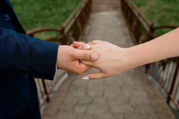 hands of the groom and bride