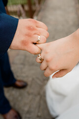 hands of the groom and bride