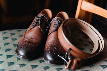 pair of shoes on wooden floor