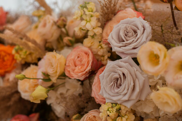 Romantic boho main table. Wedding decor with dried flowers floristry and candles, boho style.