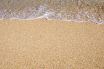 Fototapeta na wymiar wave on sand