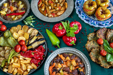 Many meals in the plates like kızartma , fritter and dolma with top view 