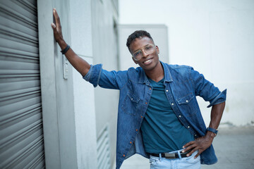 Portrait of a happy african man in the street