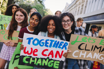 Fototapeta Happy teenage girls joining the global climate strike obraz