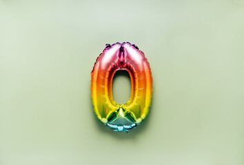 Colorful balloon number 0 on light green background. New Year of birthday concept