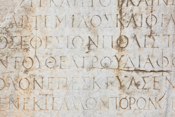 Ancient greek text marble carving. Ephesus historical site. Turkey