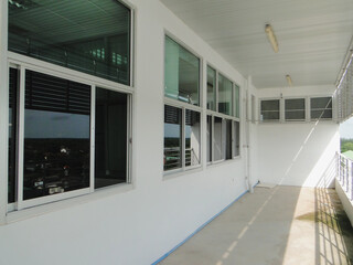 The facade of the building with a balcony